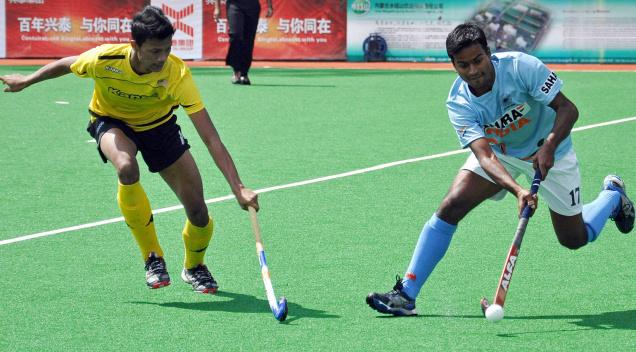 India fights back to share honours with Malaysia